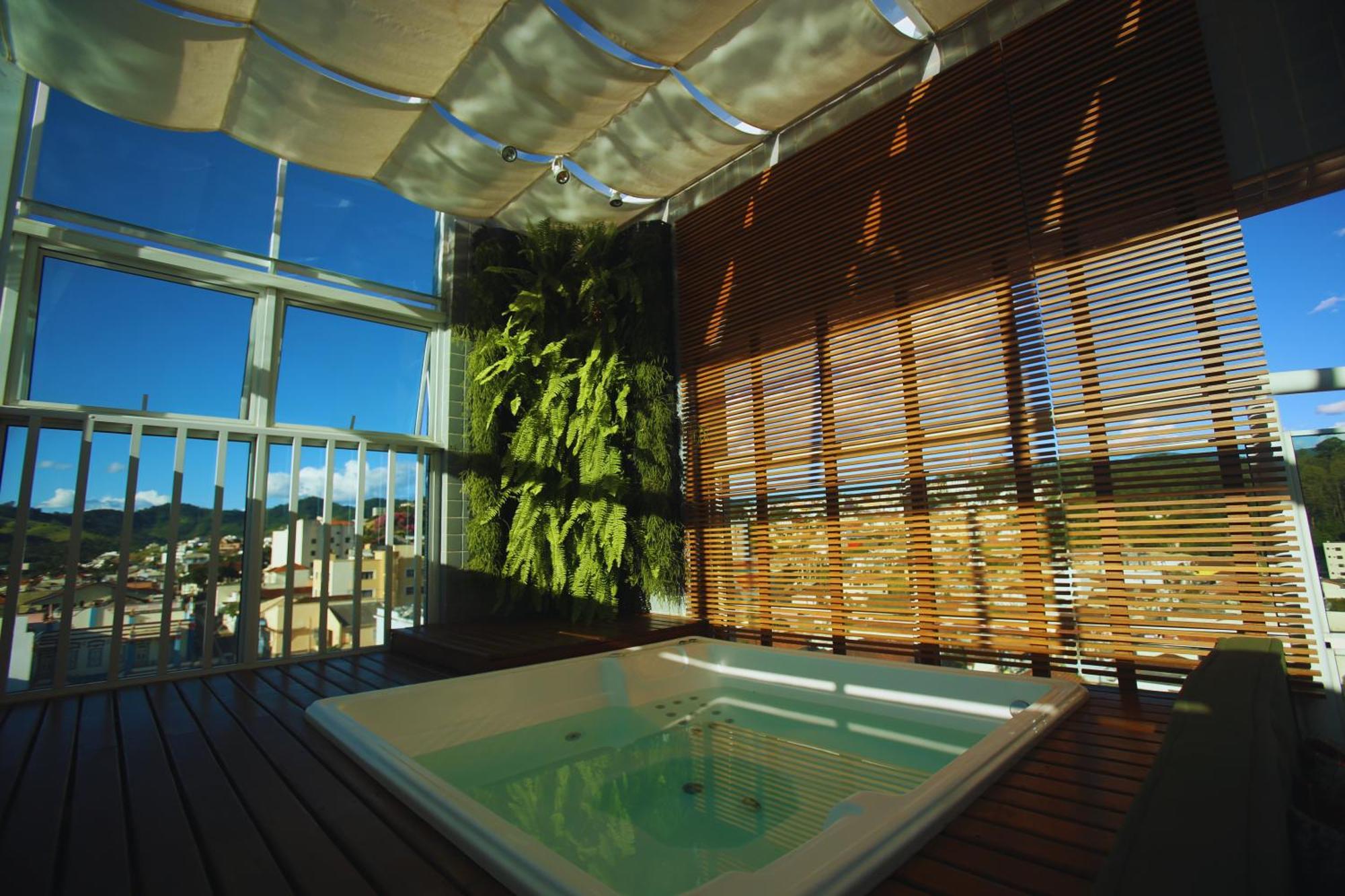 Gontijo Inn Hotel Itajuba  Exterior photo A rooftop spa